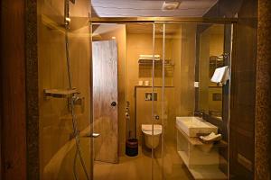 Vannituba majutusasutuses Woodapple Hotel and Spa