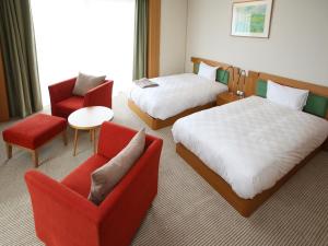 Postel nebo postele na pokoji v ubytování Auberge de South Terrace