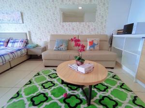 A seating area at Comfort Zone Premium Guesthouse @ Evo Bangi