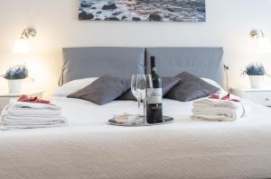 A bed or beds in a room at Il Leone Blu