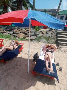 Gostje med bivanjem v nastanitvi New SeaSide Inn Hikkaduwa