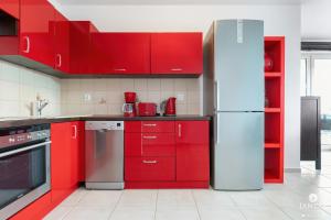 Kuchyňa alebo kuchynka v ubytovaní Jantar Apartamenty- Zielone Tarasy