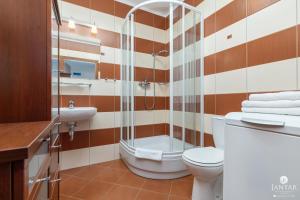 Kúpeľňa v ubytovaní Jantar Apartamenty- Zielone Tarasy