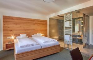 Postel nebo postele na pokoji v ubytování ElzLand Hotel 9 Linden