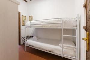 Ένα ή περισσότερα κρεβάτια σε δωμάτιο στο Center ZTL Lovely Apartment