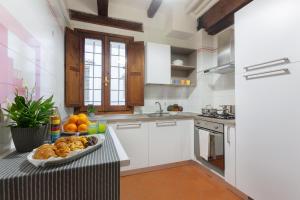 Η κουζίνα ή μικρή κουζίνα στο Center ZTL Lovely Apartment