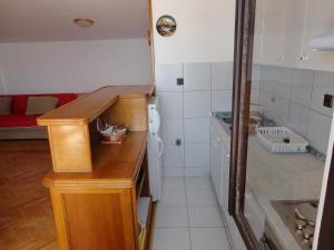 Kuchyňa alebo kuchynka v ubytovaní APARTMAN LUCIJAN
