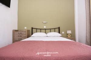 Postel nebo postele na pokoji v ubytování Anna Pousi Studios & Apartment