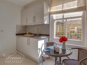 Køkken eller tekøkken på Covecastle Cottage