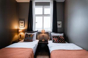 Postel nebo postele na pokoji v ubytování Hotel Leifur Eiriksson