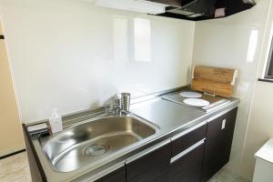 Η κουζίνα ή μικρή κουζίνα στο YUFU-Inn プライベートな露天風呂付き-由布院駅徒歩2分 +78 φωτογραφίες