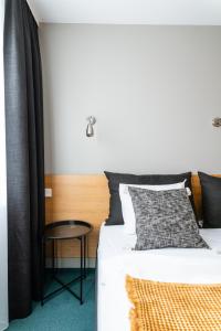 Postel nebo postele na pokoji v ubytování Hotel Leifur Eiriksson