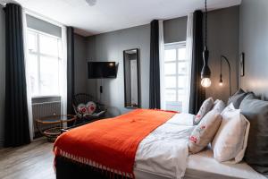 Säng eller sängar i ett rum på Hotel Leifur Eiriksson