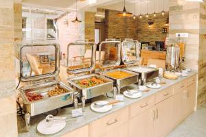 Cucina o angolo cottura di Pema Boutique Hotel