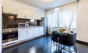 A cozinha ou cozinha compacta de Teplice Apartments Dlouhá