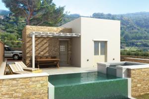 a villa with a swimming pool and a house at Lux View Suites in Kyra Panagia