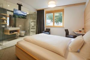 Kuchyň nebo kuchyňský kout v ubytování ElzLand Hotel 9 Linden