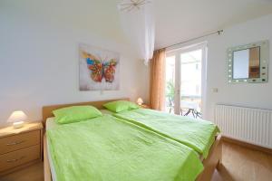 Ein Bett oder Betten in einem Zimmer der Unterkunft Apartment Vjeko