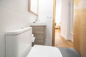 Ένα ή περισσότερα κρεβάτια σε δωμάτιο στο Duplex Flamingo Cadiz +37 φωτογραφίες