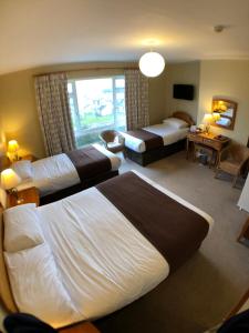 Postel nebo postele na pokoji v ubytování Beach Haven B&B