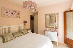 Postel nebo postele na pokoji v ubytování Veoapartment Santa Cruz