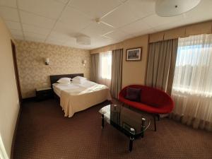 Postel nebo postele na pokoji v ubytování Toila Spa Hotel