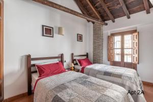 Postel nebo postele na pokoji v ubytování San José Apartments