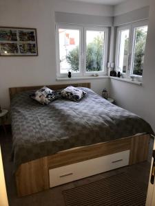 Postel nebo postele na pokoji v ubytování Villa Primosten