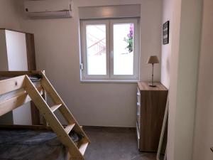 Postel nebo postele na pokoji v ubytování Villa Primosten