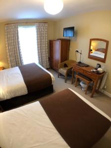 Postel nebo postele na pokoji v ubytování Beach Haven B&B