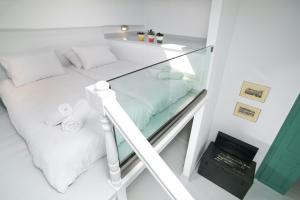 A bed or beds in a room at Scaleri Port Home