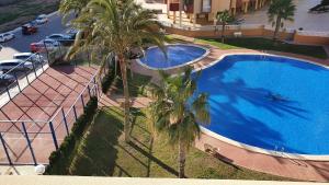 Basen w obiekcie Apartamento ÁTICO SOL Los Miradores del Puerto lub w pobliżu