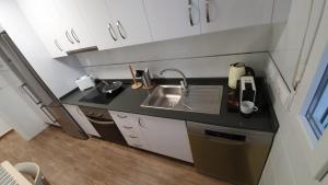 Kuchnia lub aneks kuchenny w obiekcie Apartamento ÁTICO SOL Los Miradores del Puerto