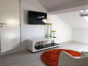 TV a/nebo společenská místnost v ubytování Azores Calheta Inn Apartment T2