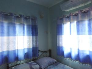 Postel nebo postele na pokoji v ubytování Krasom Homestay + 12 fotografií