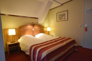 Postel nebo postele na pokoji v ubytování Hotel De Torenhoeve + 37 fotografií