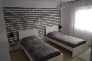 Ένα ή περισσότερα κρεβάτια σε δωμάτιο στο Nice Appartement near TradeFair and City 8 Min.