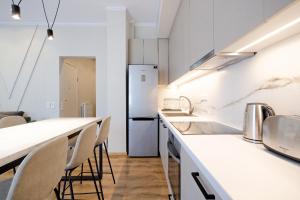 Kuchyňa alebo kuchynka v ubytovaní The Flirty Athens apartment
