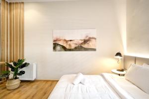 Posteľ alebo postele v izbe v ubytovaní The Flirty Athens apartment