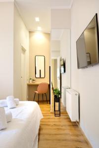 Posteľ alebo postele v izbe v ubytovaní The Flirty Athens apartment