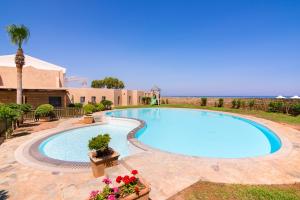 The swimming pool at or close to Kalimera Kriti Hotel & Village Resort