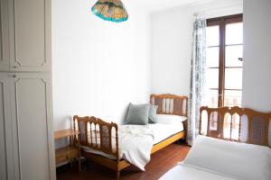Ein Bett oder Betten in einem Zimmer der Unterkunft IseoLakeRental - Villa Flavia