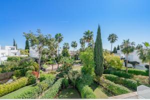 Vonkajšia záhrada v ubytovaní OleHolidays Guadalmina Golf Plaza