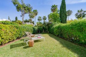 Vonkajšia záhrada v ubytovaní OleHolidays Guadalmina Golf Plaza