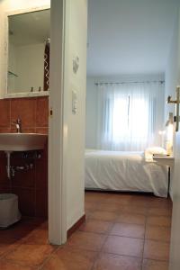 Letto o letti in una camera di Hotel 3 Arcs