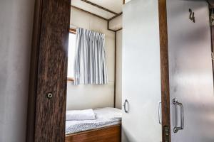 Una cama o camas en una habitación de Amice