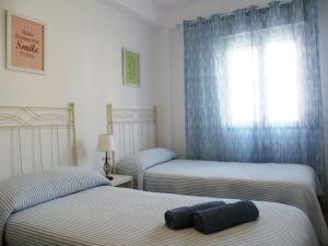 Posteľ alebo postele v izbe v ubytovaní El piso de Ursula