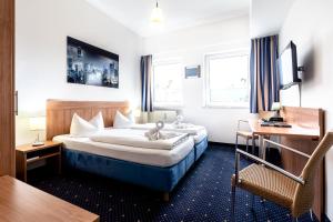 Postel nebo postele na pokoji v ubytování Hotel Fresh INN + 36 fotografií