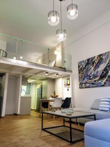 Kuchyň nebo kuchyňský kout v ubytování City House Loft