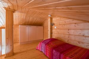 Postel nebo postele na pokoji v ubytování Lomaperkkiö Apartments